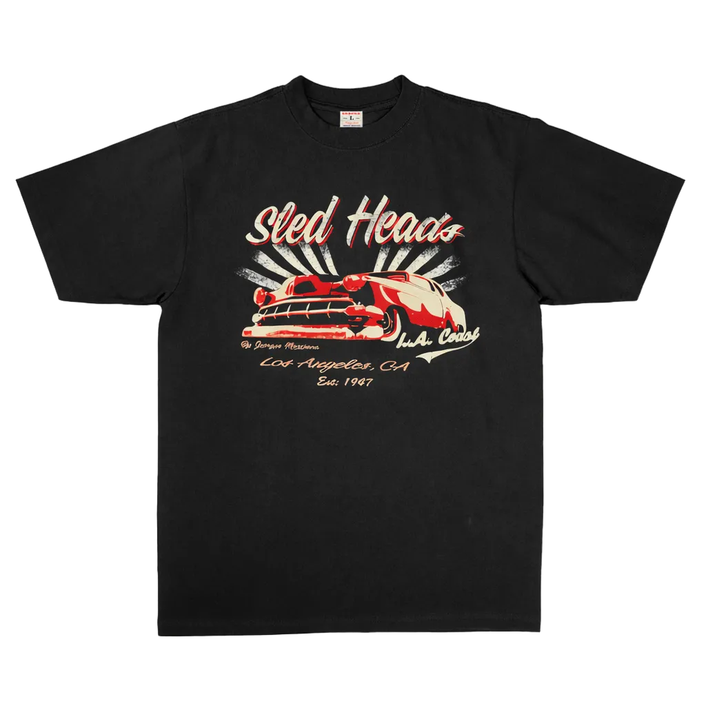 Black t-shirt with graphic design of a car and text on a white background