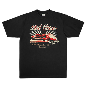 Black t-shirt with graphic design of a car and text on a white background