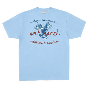 Light blue t-shirt with graphic design and text on a white background