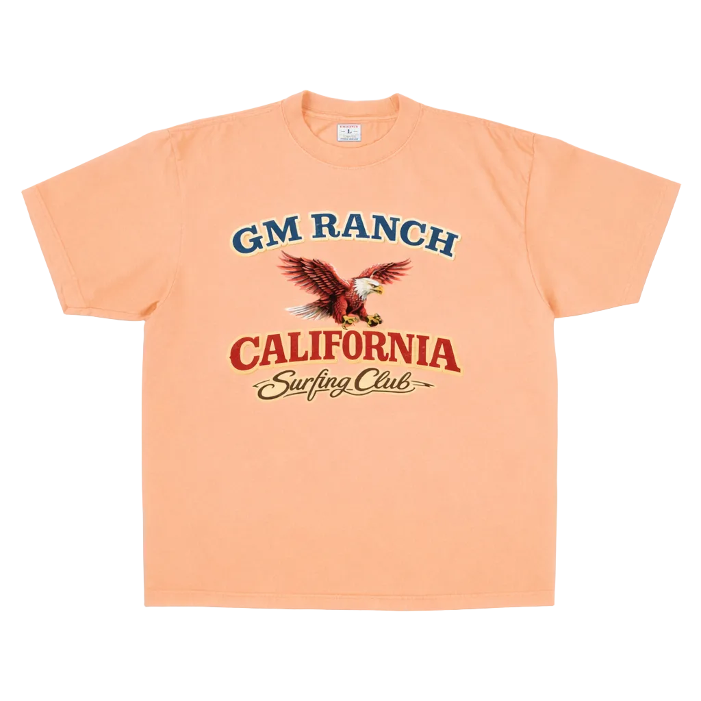 Peach-colored t-shirt with 'GM Ranch California Surfing Club' design featuring an eagle.