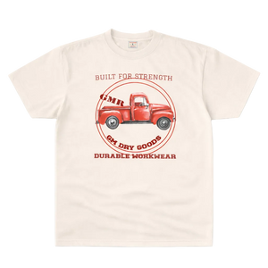 Beige t-shirt with red truck graphic and text on a white background